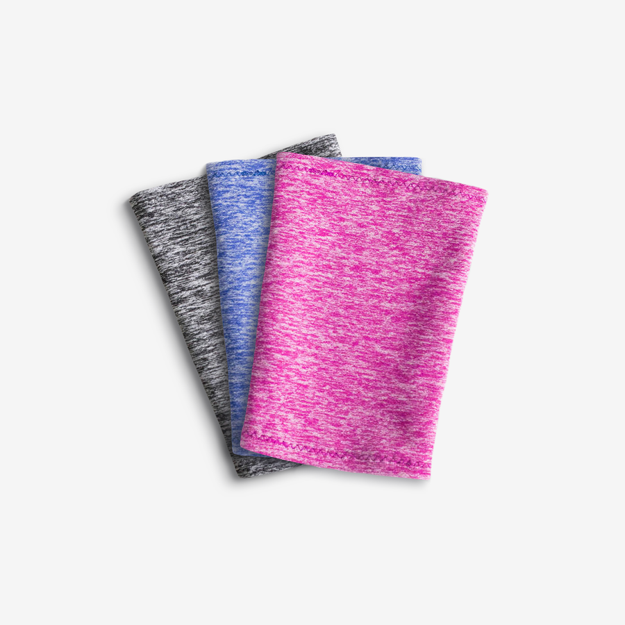 three bicep bands in charcoal, indigo, and pink with a freestyle libre