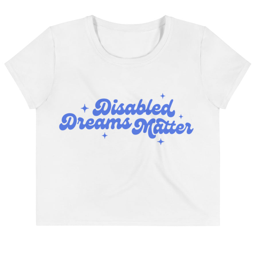 white crop tee with "disabled dreams matter" printed in blue on the front