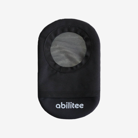 single black waterproof ostomy pouch cover with the abilitee logo printed on the back
