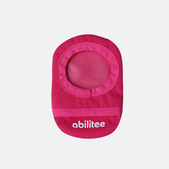 back of pink ostomy cover with abilitee logo in white