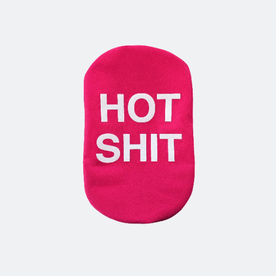 Pink ostomy cover with HOT SHIT printed in white